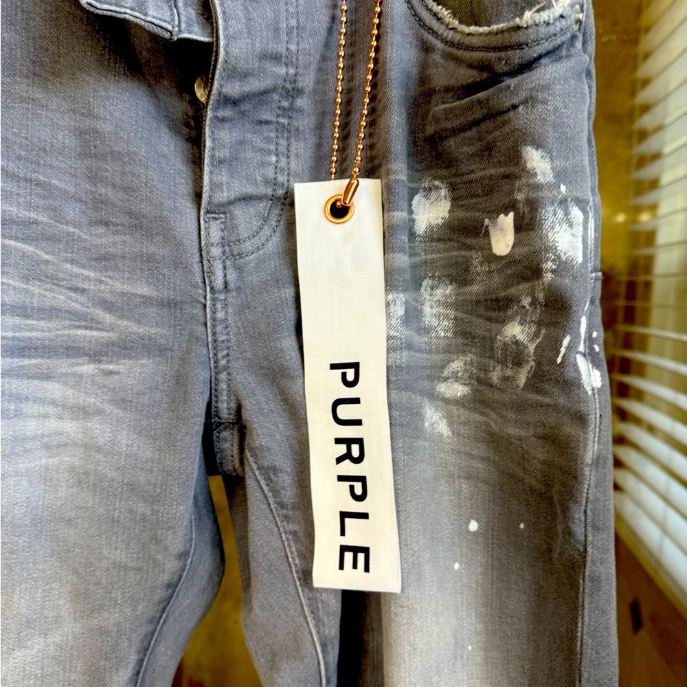 Purple jeans with paint splash
